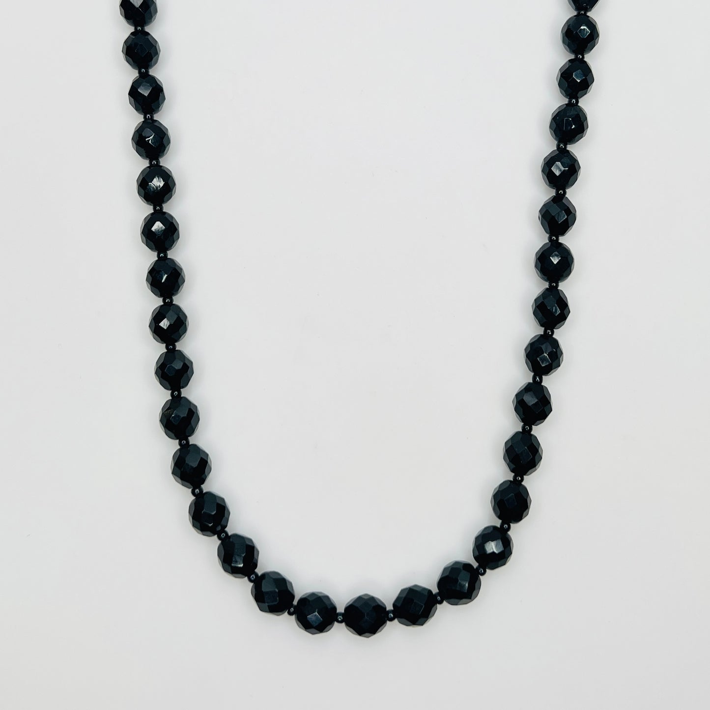 Vintage 1970s black glass bead necklace with gold tone clasp