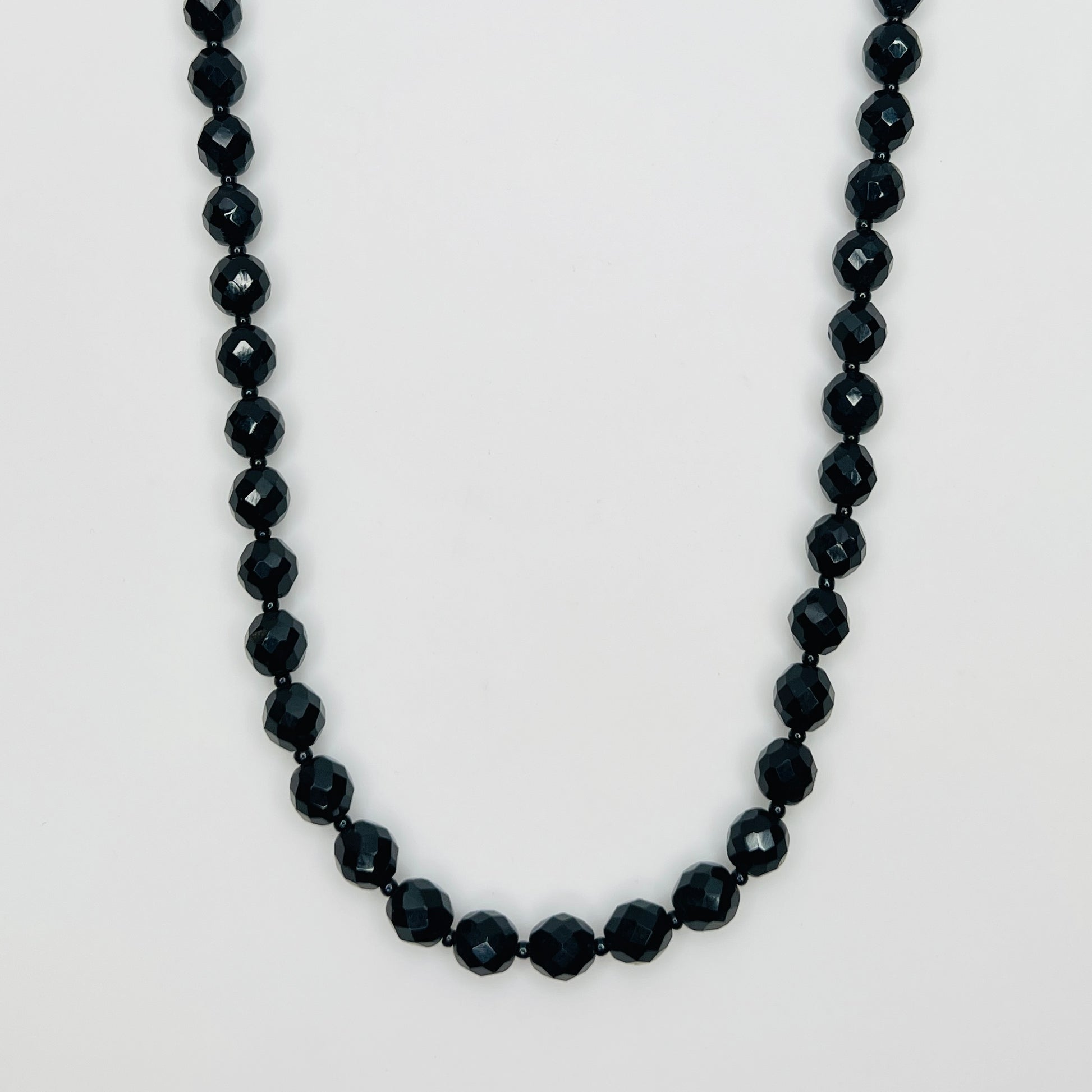 Vintage 1970s black glass bead necklace with gold tone clasp