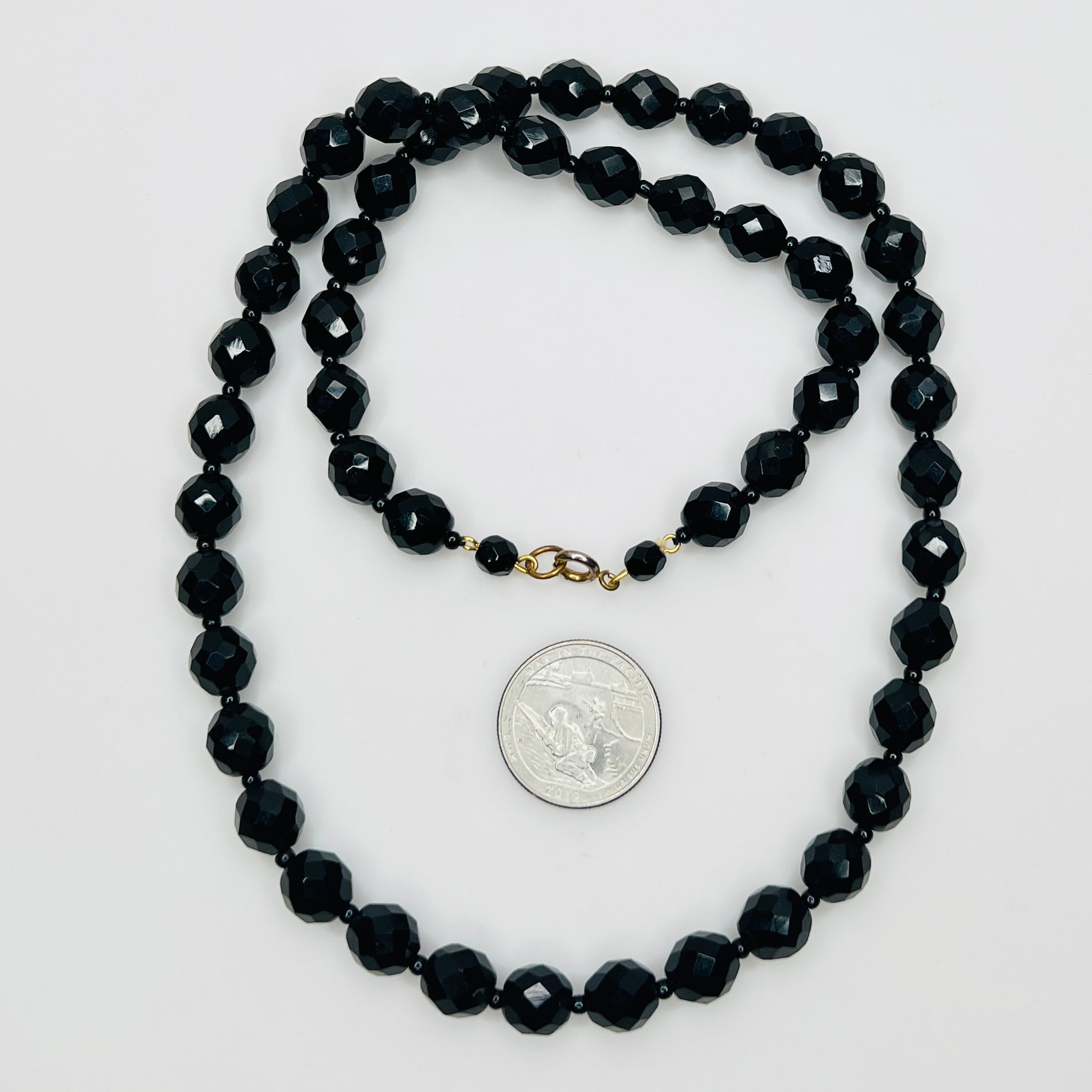 Vintage 1970s black glass bead necklace with gold tone clasp