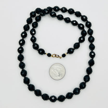 Vintage 1970s black glass bead necklace with gold tone clasp
