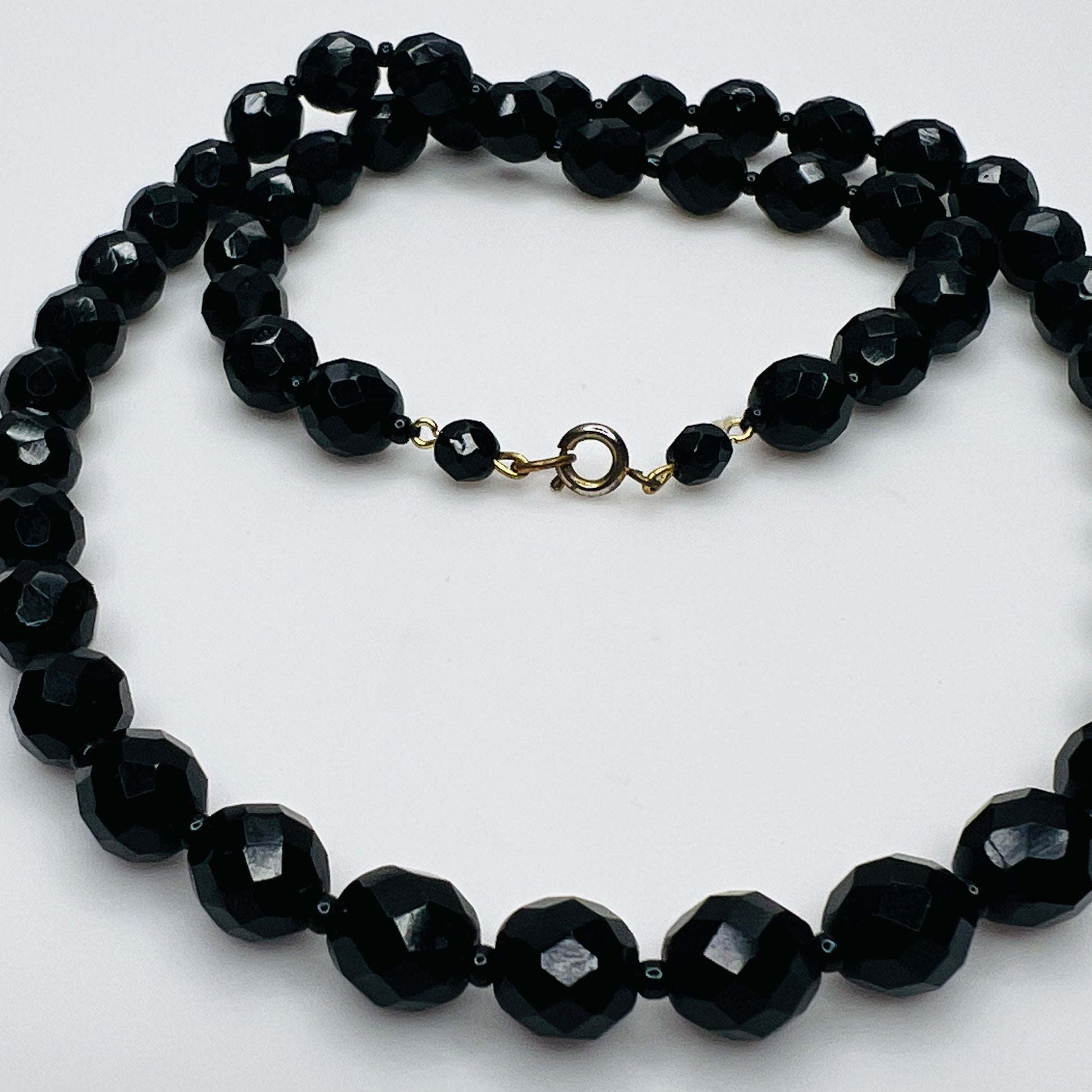 Vintage black faceted glass bead necklace strand detail