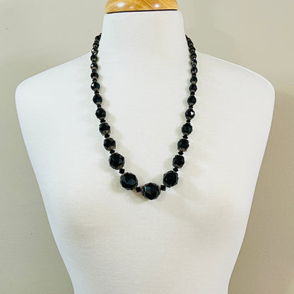 Mid-century jet black glass statement necklace with graduated faceted beads