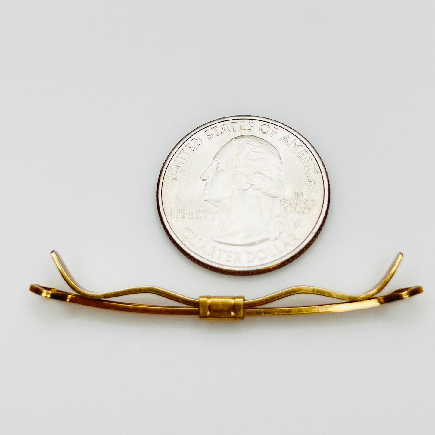 1950s gold tone collar bar with quarter for scale