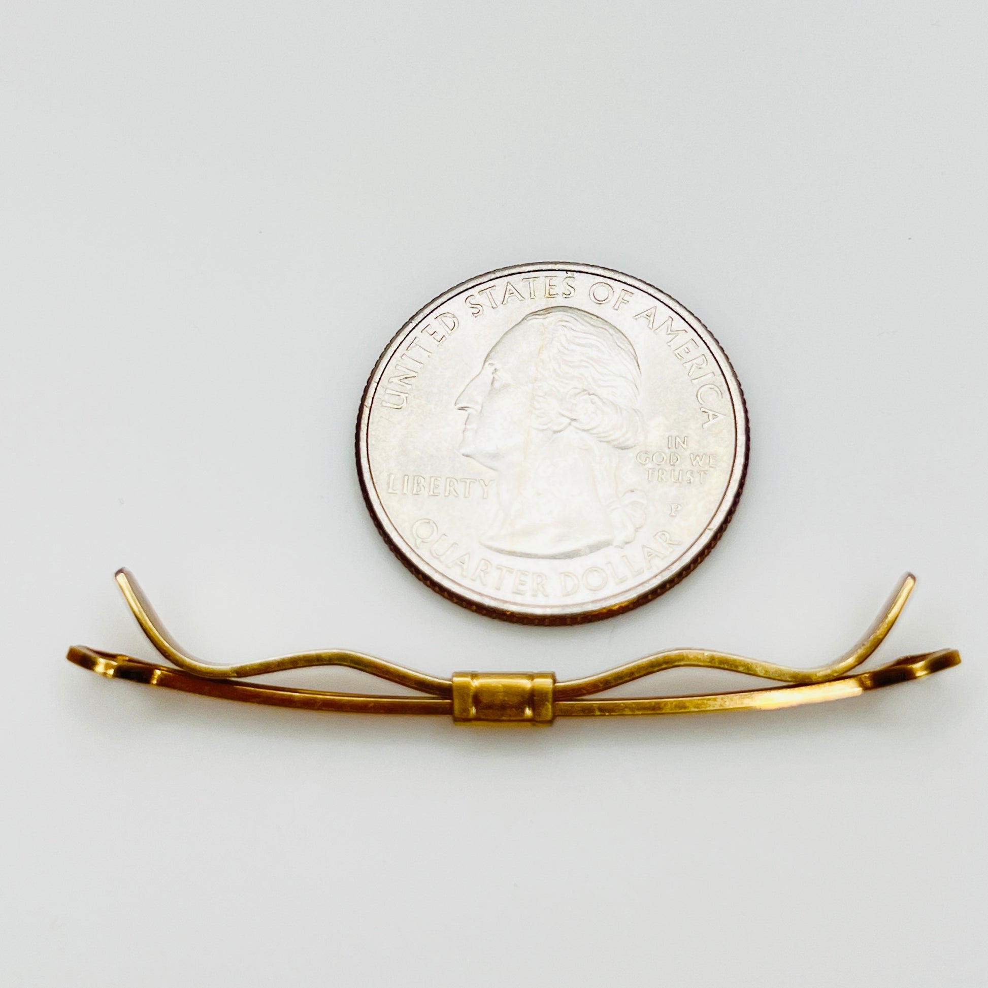 1950s gold tone collar bar with quarter for scale