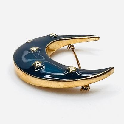 Side profile of vintage blue enamel crescent moon brooch with gold-tone finish.