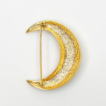Reverse of signed Krementz crescent moon brooch with secure pin clasp.