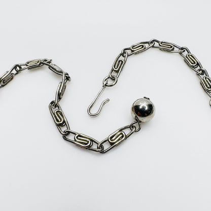 Original paperclip chain extension and signed hook clasp on vintage Lisner necklace