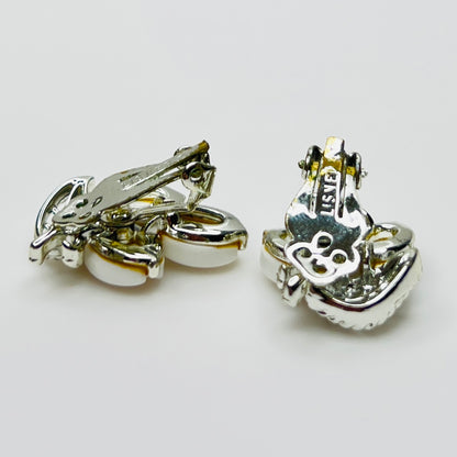 Back of signed Lisner clip-on earrings showing original clip findings