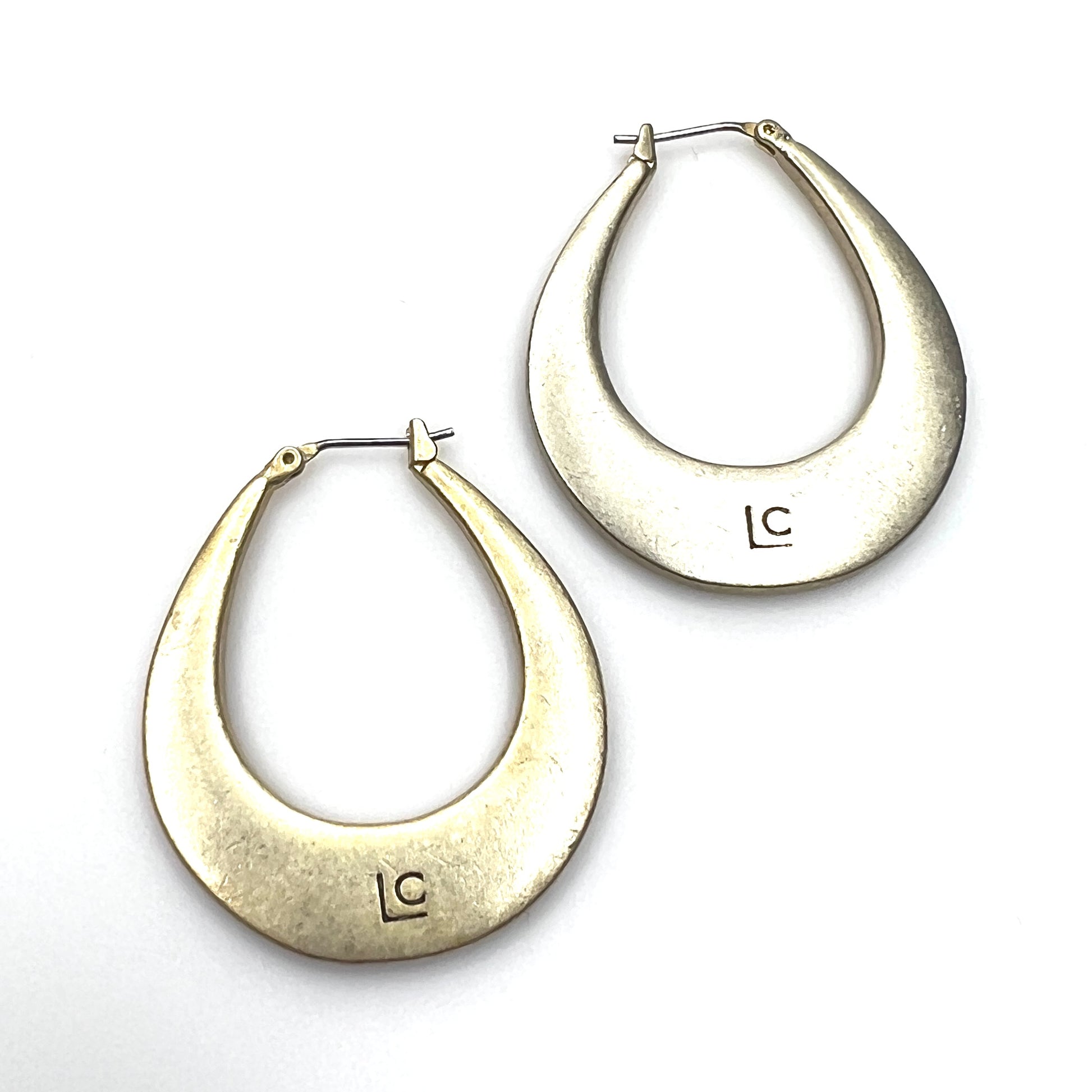 Reverse of signed Liz Claiborne 1980s gold tone hoop earrings
