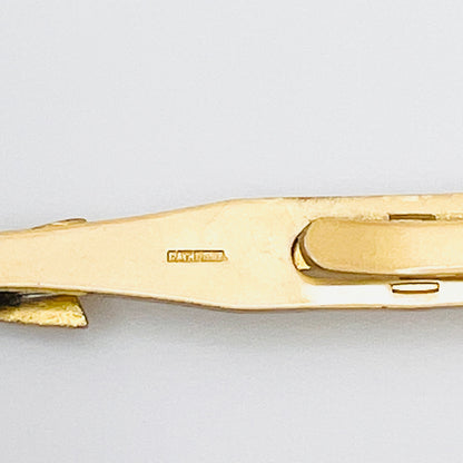 Gold tone arrow tie accessory with Pat Pend stamp