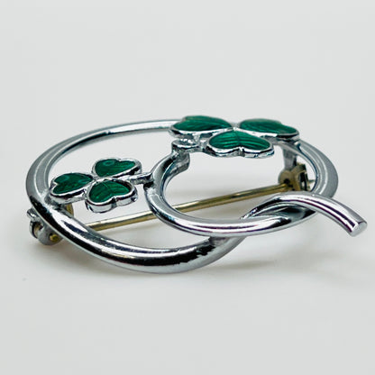 Side profile of vintage Mizpah green enamel shamrock brooch showing dimensional design.