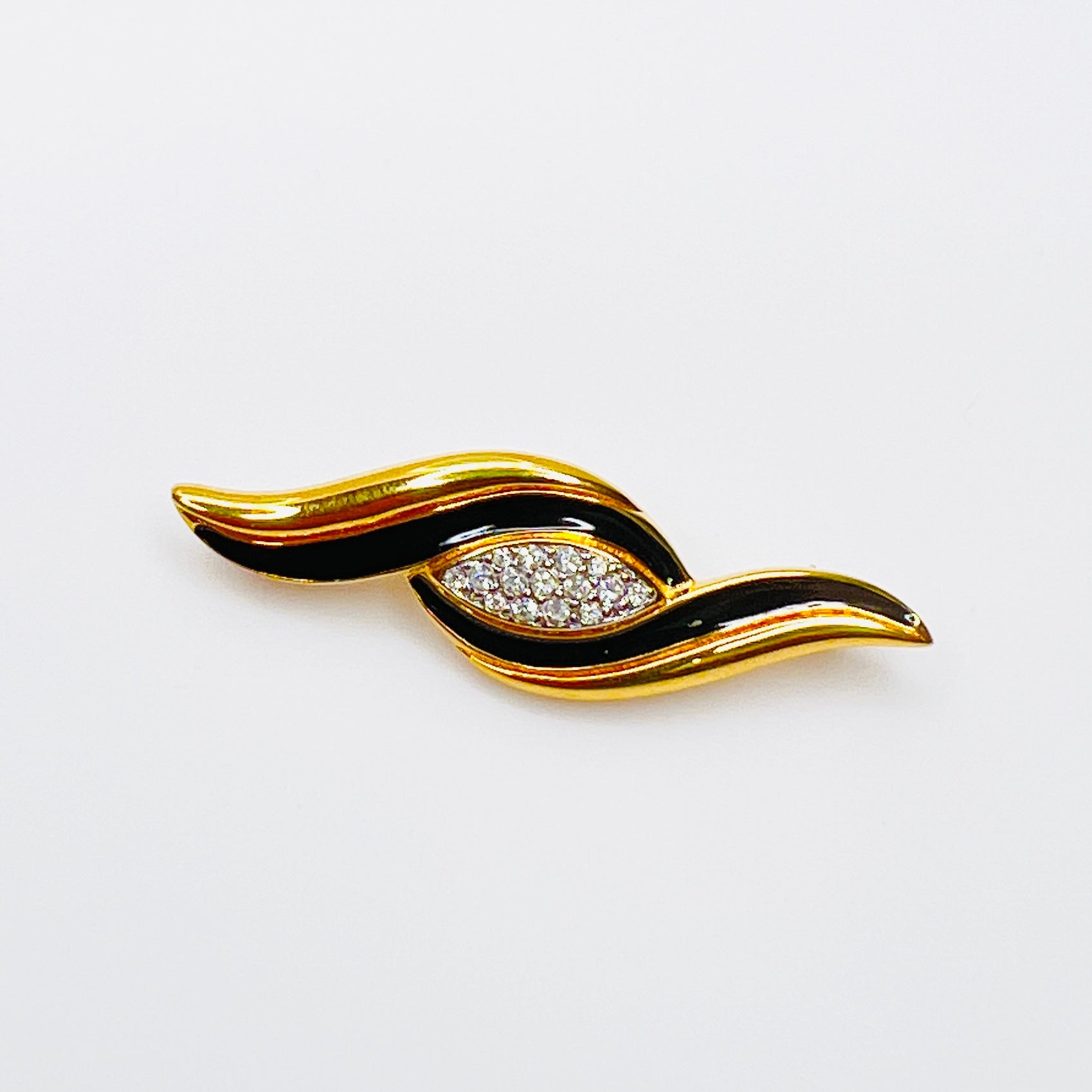 Vintage Monet black enamel and rhinestone bar brooch in gold-tone setting