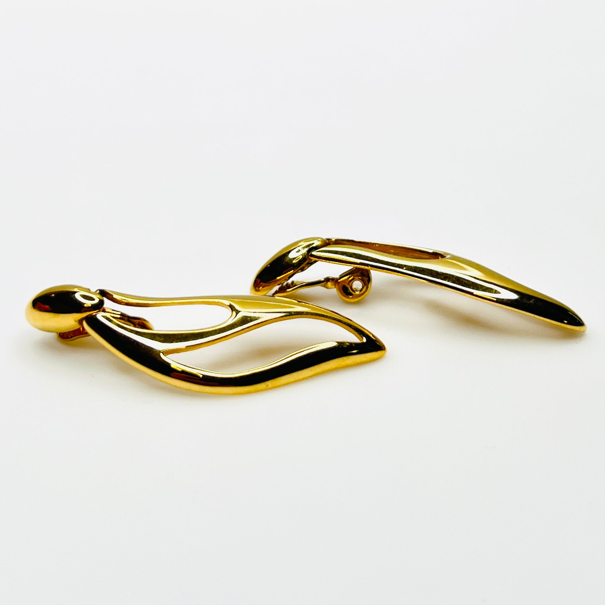 Side profile of vintage Monet sculptural gold-tone clip-on earrings