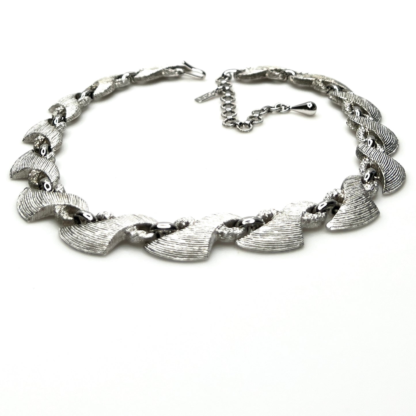 Vintage 1960s Monet textured silver tone choker with extender chain