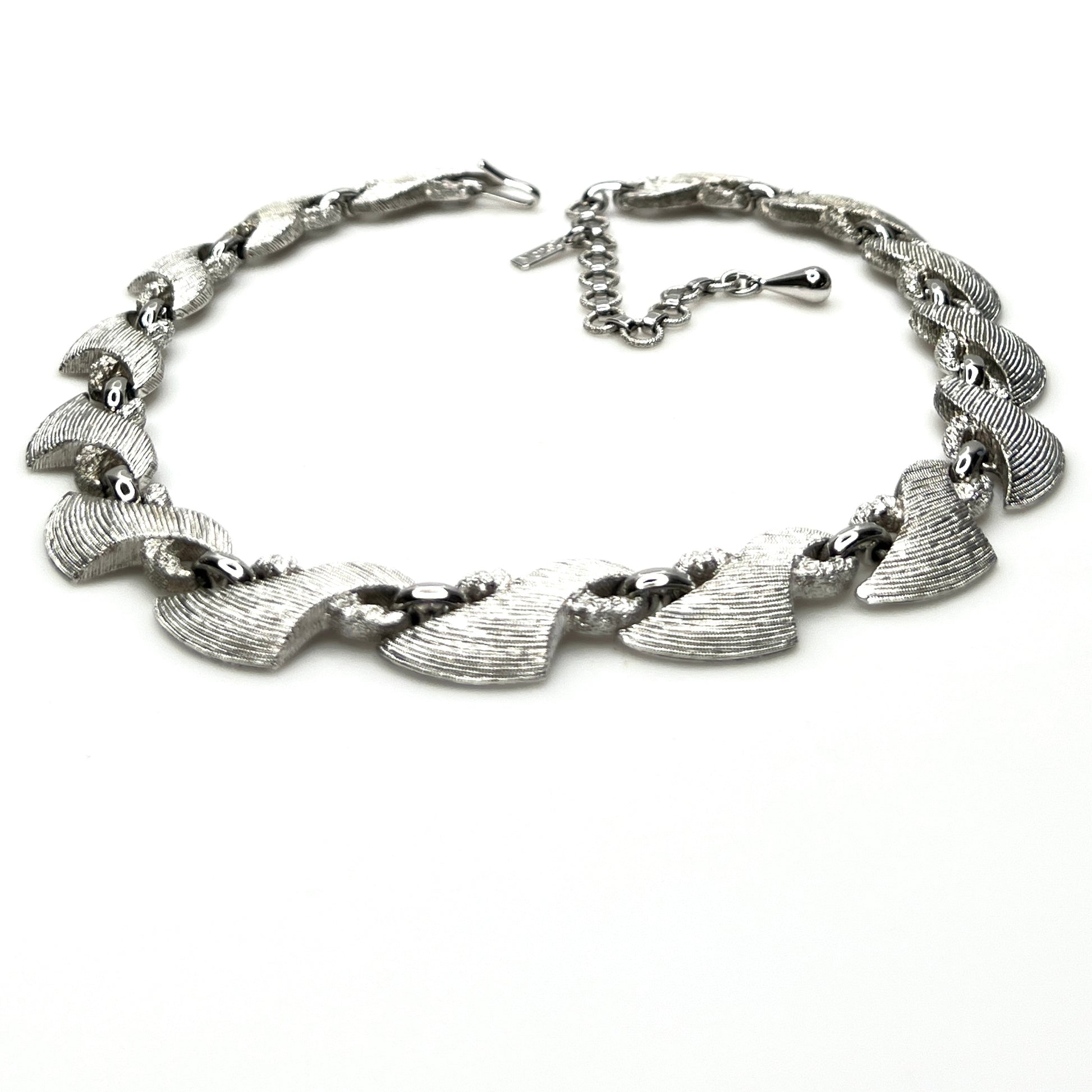 Vintage 1960s Monet textured silver tone choker with extender chain