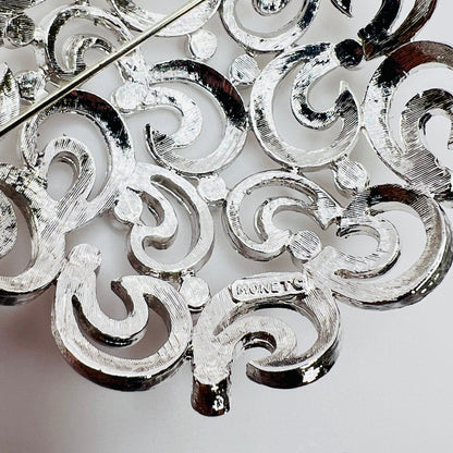 Back of Monet brooch showing clasp and signature