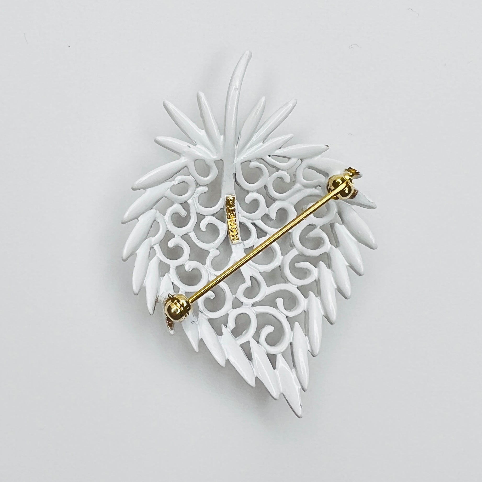 Back of signed Monet strawberry brooch