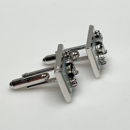 Rectangular silver cufflinks with mother of pearl inlay and raised silver lion motif
