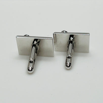 Rectangular silver cufflinks with mother of pearl inlay and raised silver lion motif