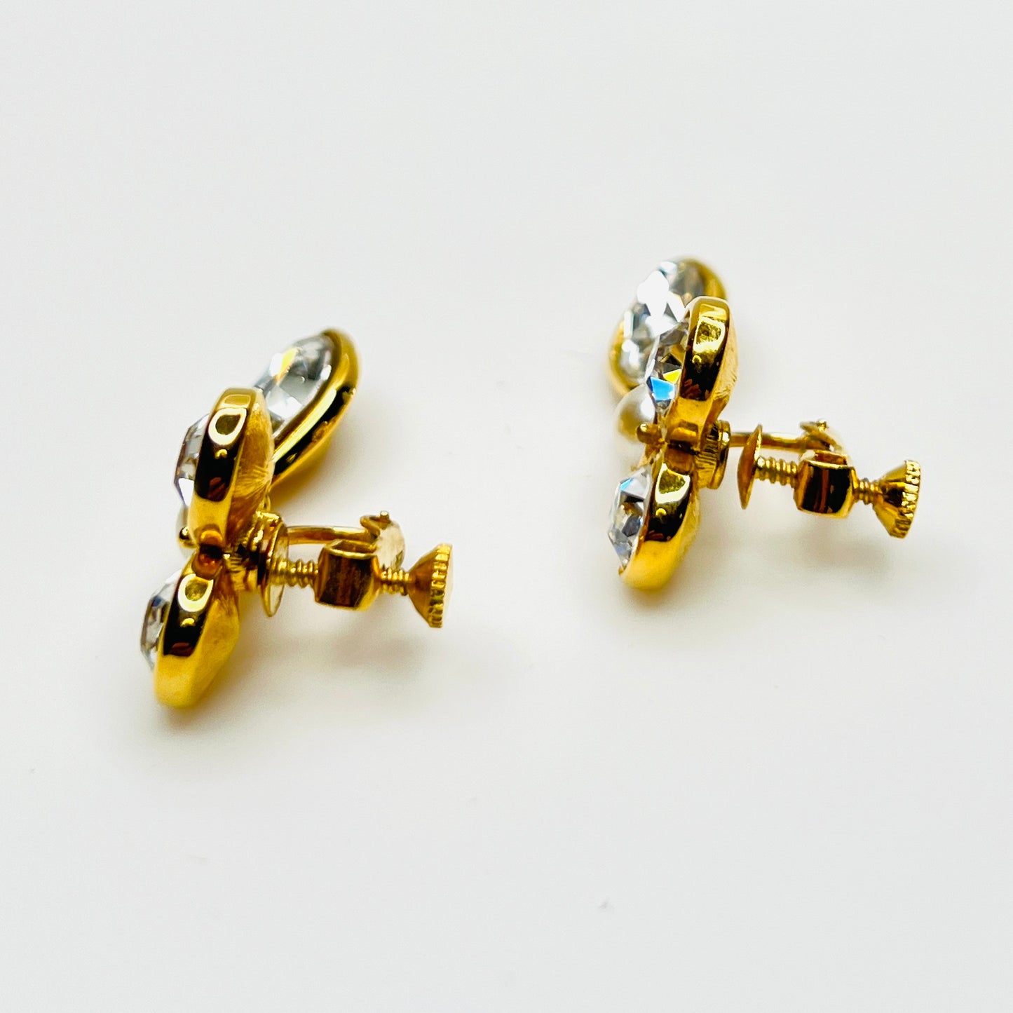 Side view of vintage Napier adjustable clip-on rhinestone earrings