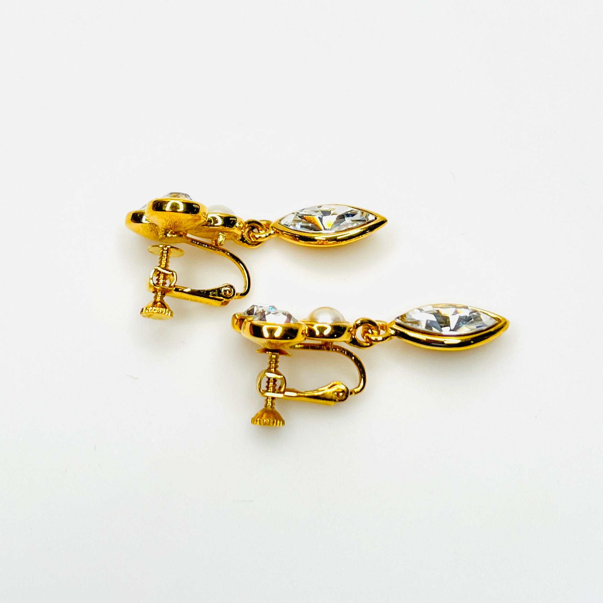 Side view of vintage Napier adjustable clip-on rhinestone earrings