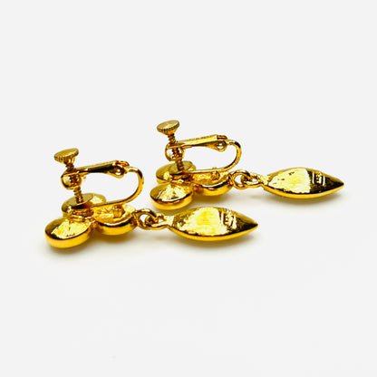 Side view of vintage Napier adjustable clip-on rhinestone earrings