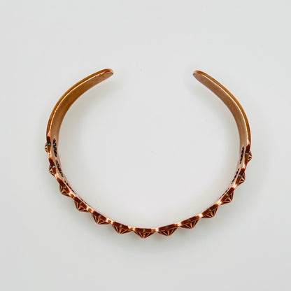 Top view of vintage copper Southwestern cuff bracelet