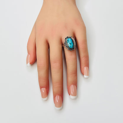 Southwestern turquoise sterling silver ring on hand
