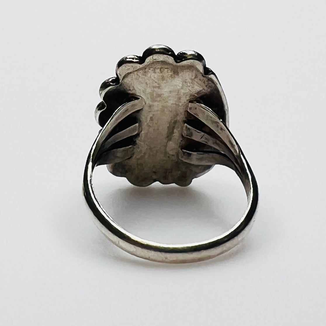 Back view of vintage sterling silver artisan turquoise ring