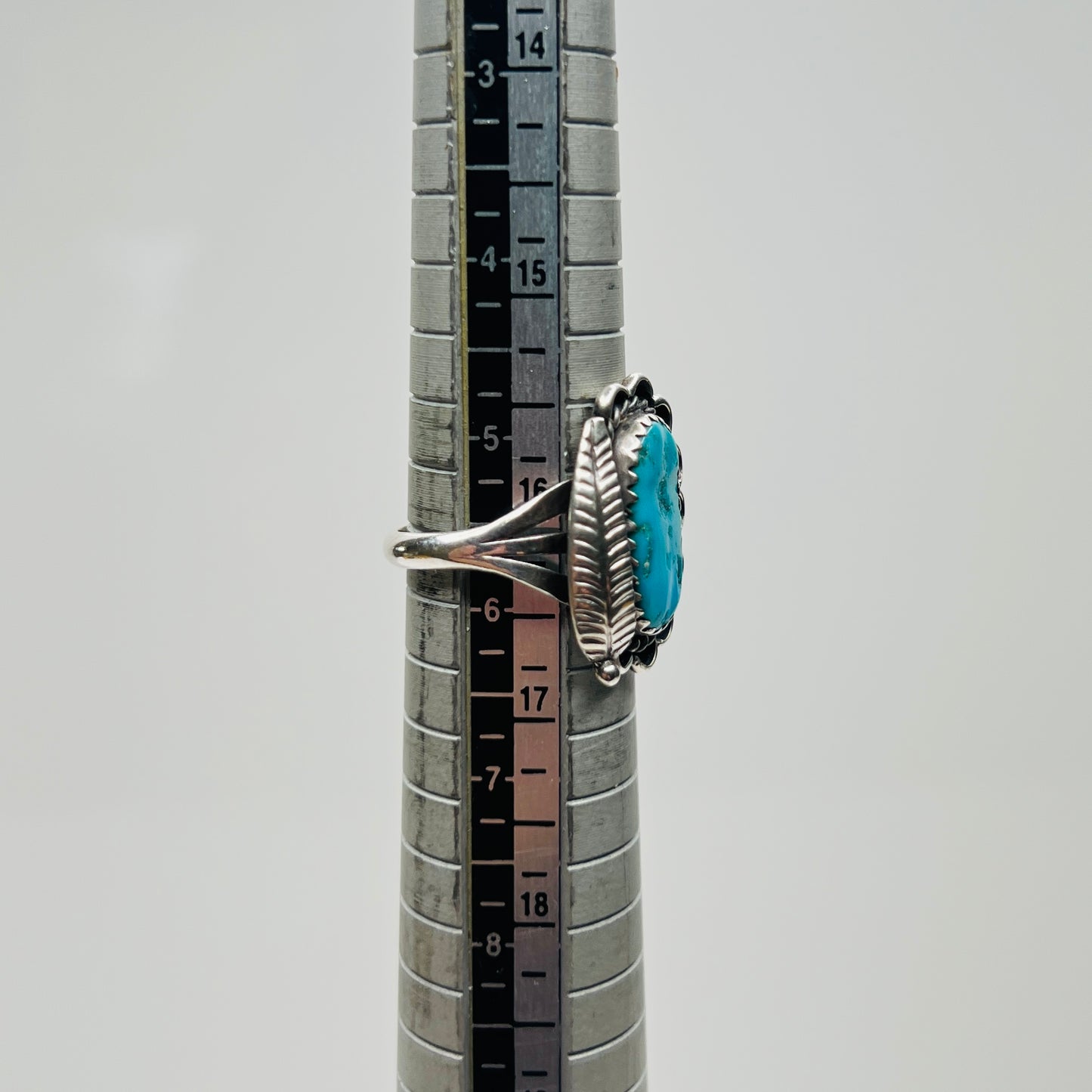 Size 5.75 Native American turquoise ring on mandrel