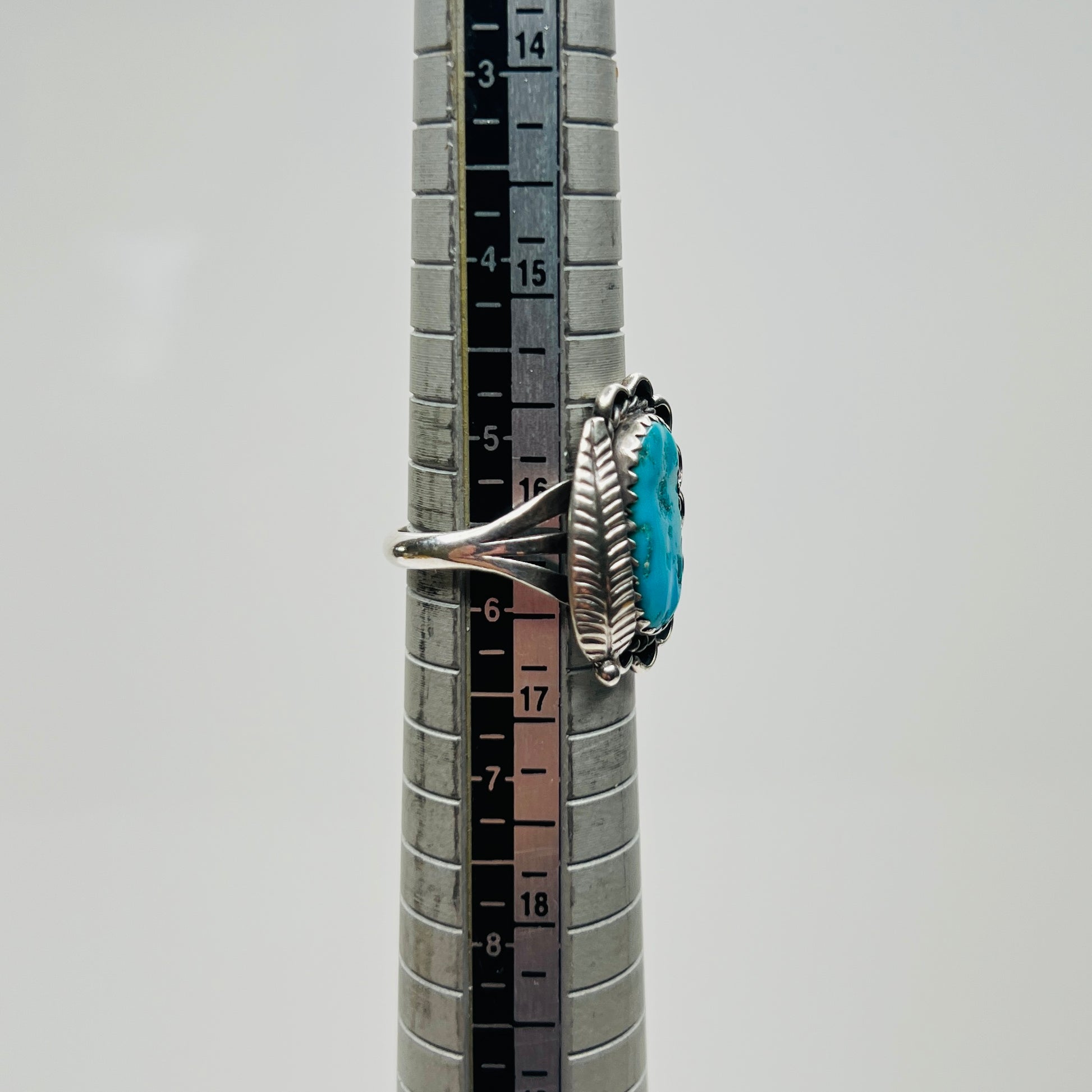 Size 5.75 Native American turquoise ring on mandrel