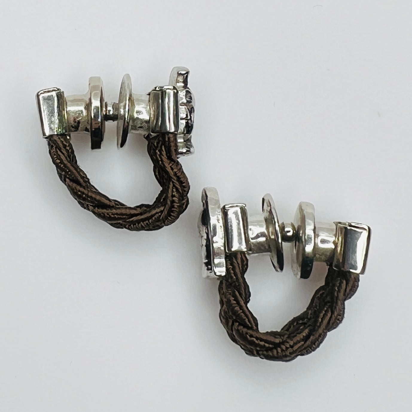 Side view wraparound cufflinks snap closure detail