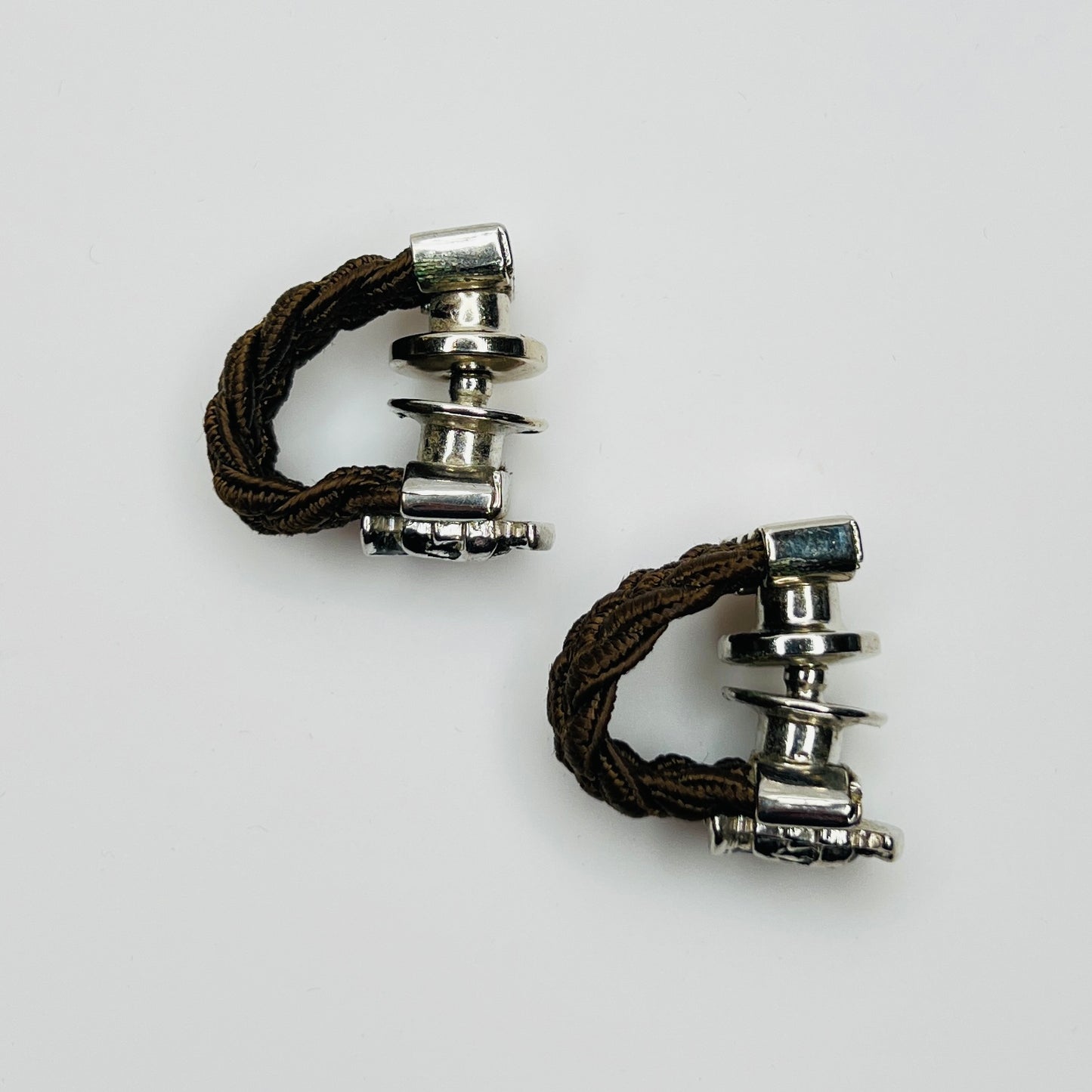 Side view wraparound cufflinks snap closure detail