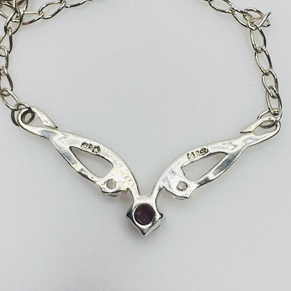 Back of pendant showing 925 and CA maker mark