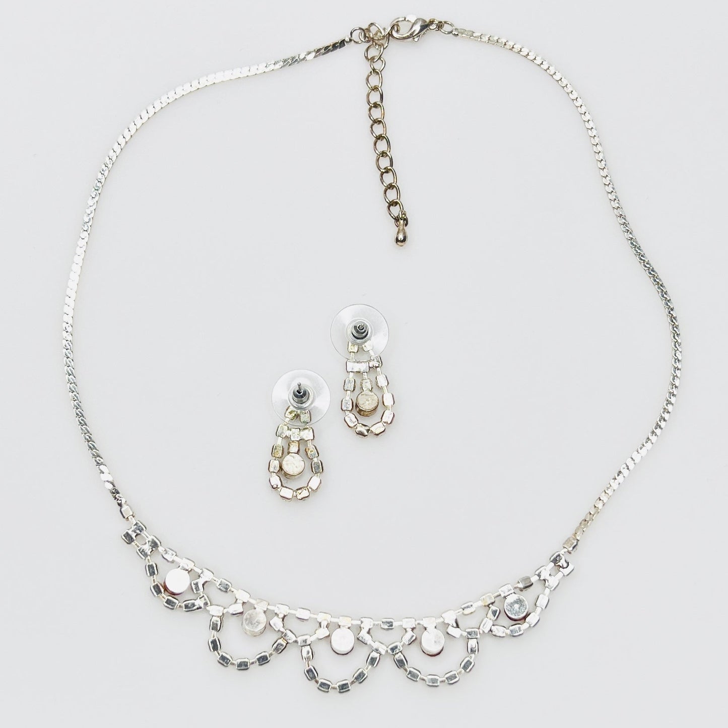 Back view of vintage rhinestone necklace and earrings