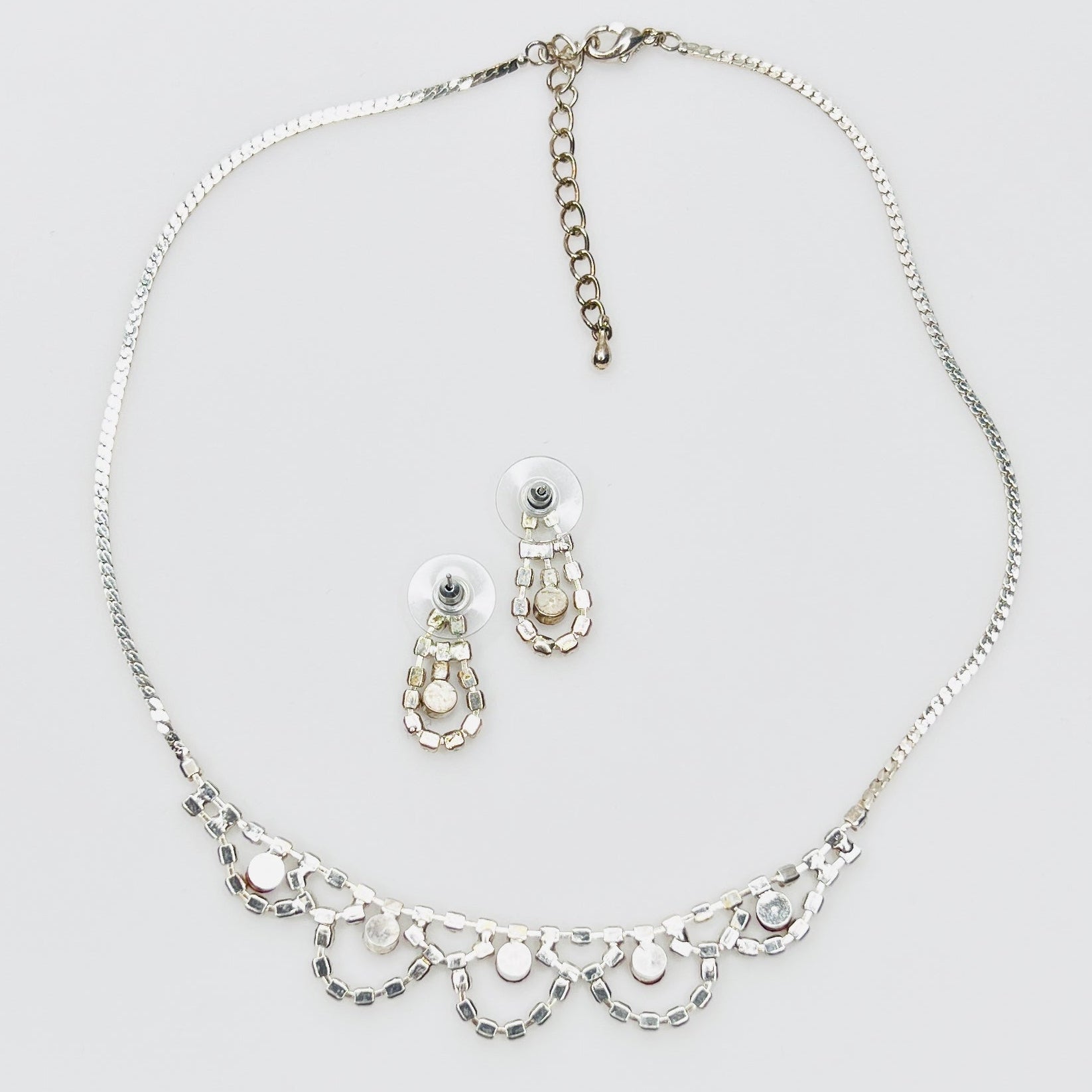 Back view of vintage rhinestone necklace and earrings