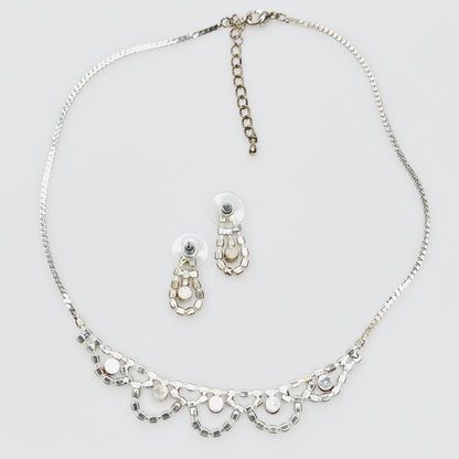 Back view of vintage rhinestone necklace and earrings