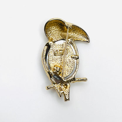 Reverse of signed Sarah Coventry 1970s toucan jelly belly brooch with pin closure