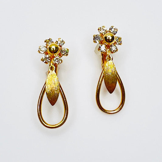 Vintage Sarah Coventry rhinestone flower clip on dangle earrings in gold tone