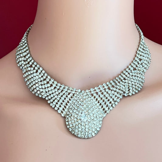 Vintage scalloped rhinestone necklace with domed centerpiece