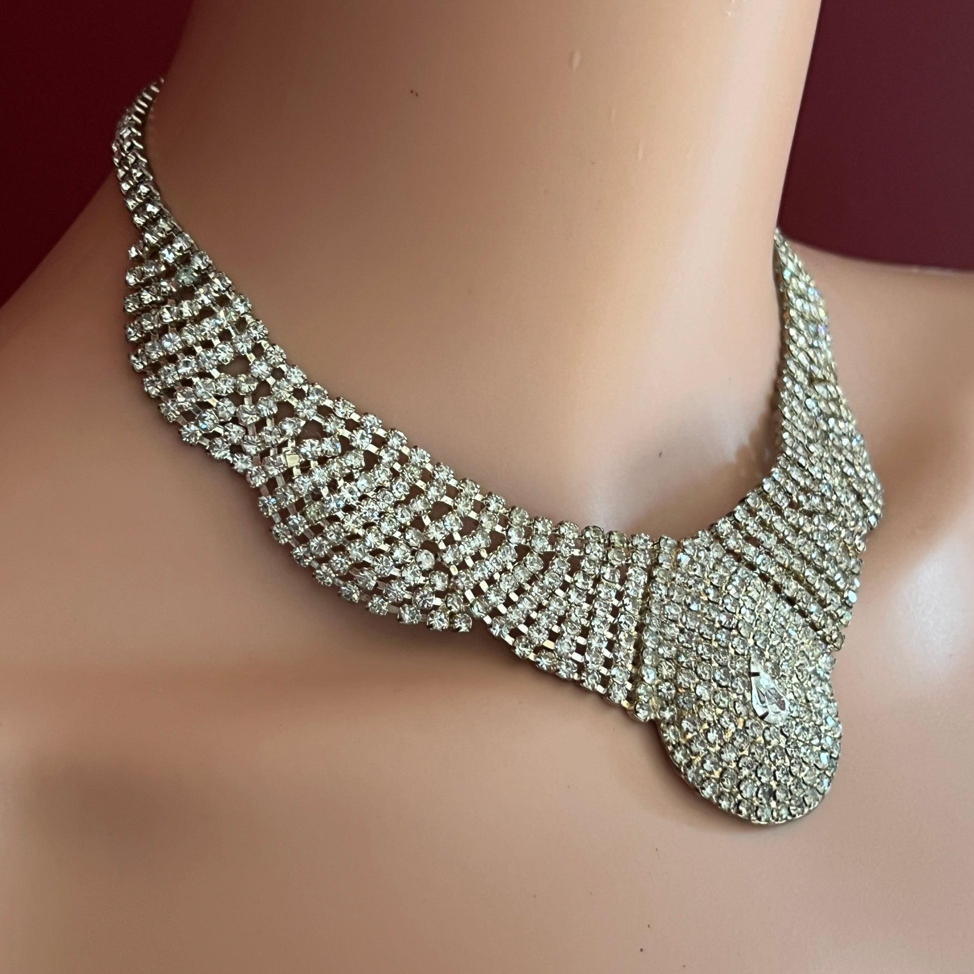 Vintage scalloped rhinestone necklace with domed centerpiece