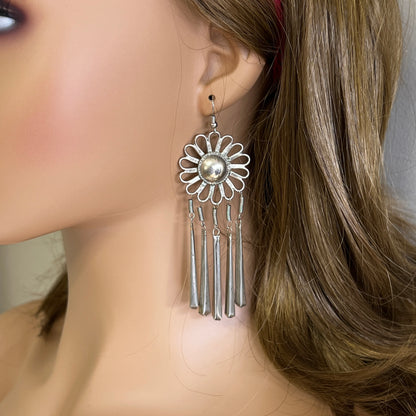 Boho ethnic flower earrings worn on ear long silver fringe
