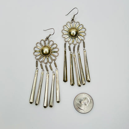 Vintage silver tone fringe earrings with quarter for size comparison