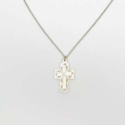 Vintage Bethlehem Mother of Pearl filigree cross pendant on sterling silver chain.