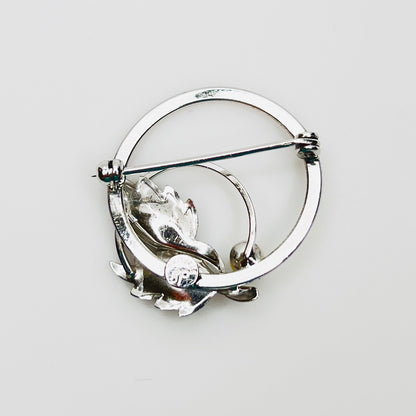 Reverse of signed DCE sterling silver brooch with safety clasp