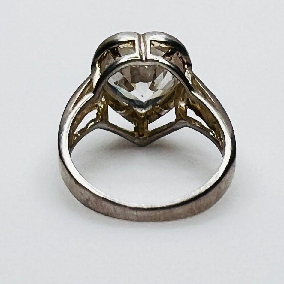 Underside view showing open gallery of heart stone setting