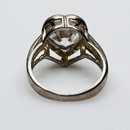Underside view showing open gallery of heart stone setting