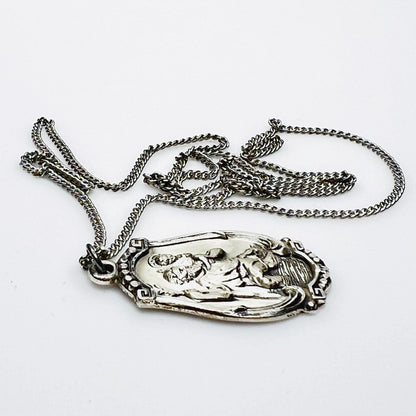 Side profile of Hayward sterling St. Christopher pendant necklace.