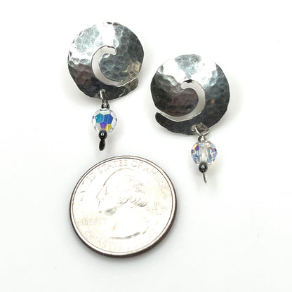 Hammered sterling silver spiral earrings with aurora borealis crystal accents with quarter for scale