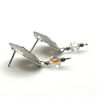 Side view Vintage hammered sterling silver spiral earrings with aurora borealis crystal dangles